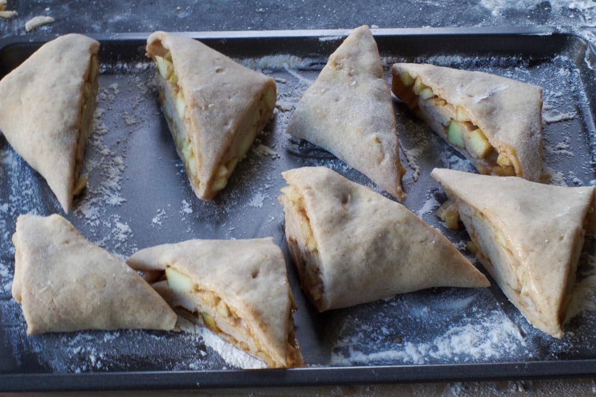 Scones transferred to a floured plate or baking sheet prior to freezing