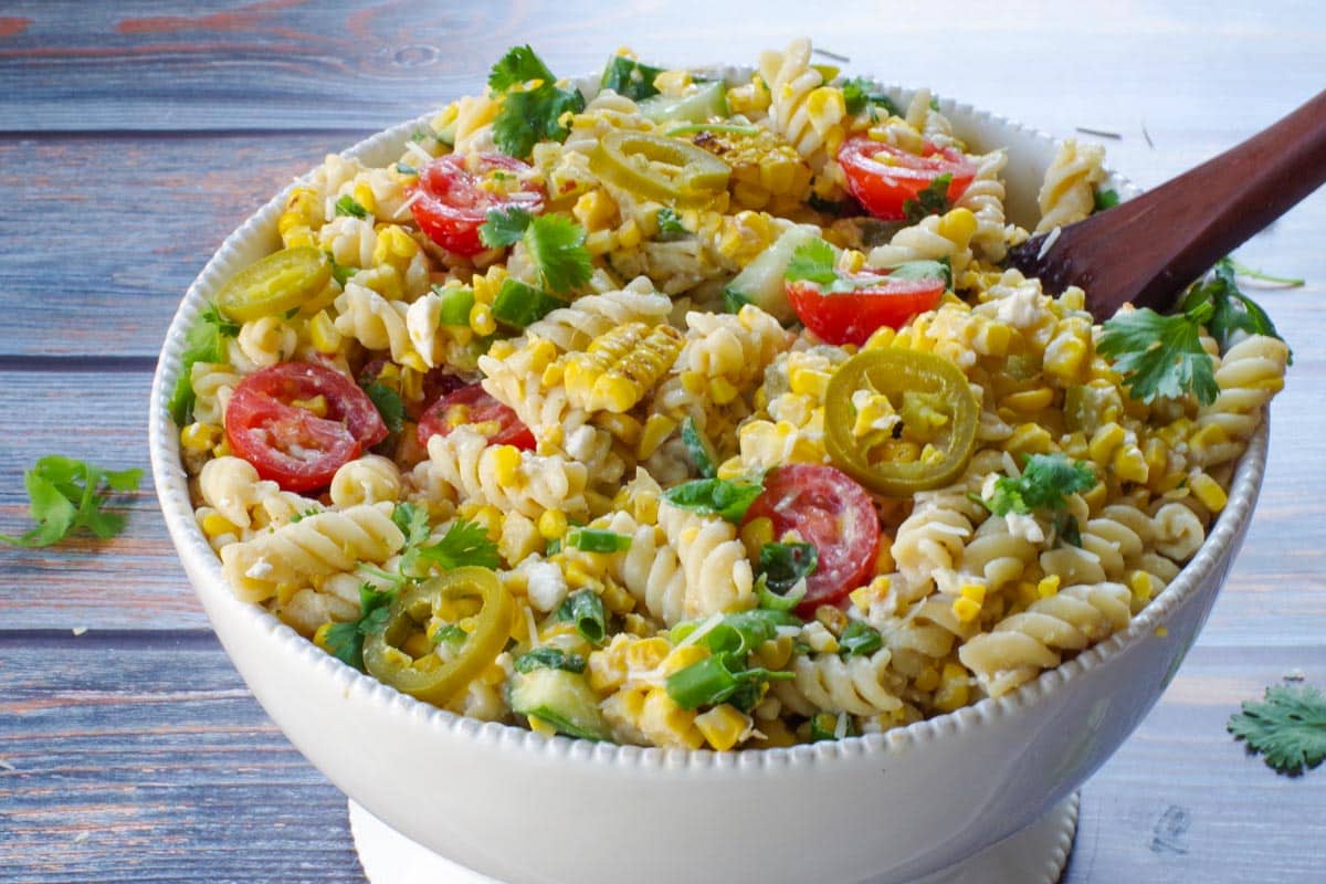 Grilled Mexican Street Corn Pasta Salad in a white bowl 