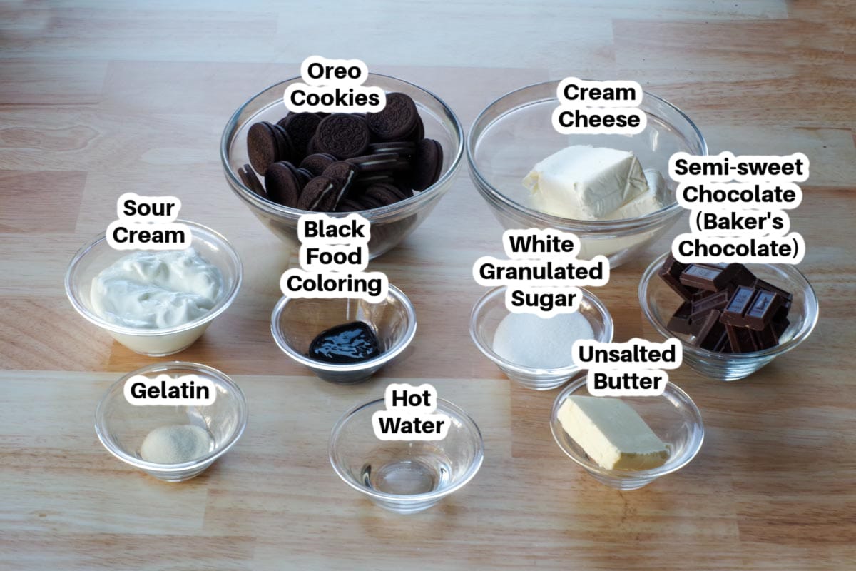 Halloween Cheesecake Ingredients in glass bowls, labelled