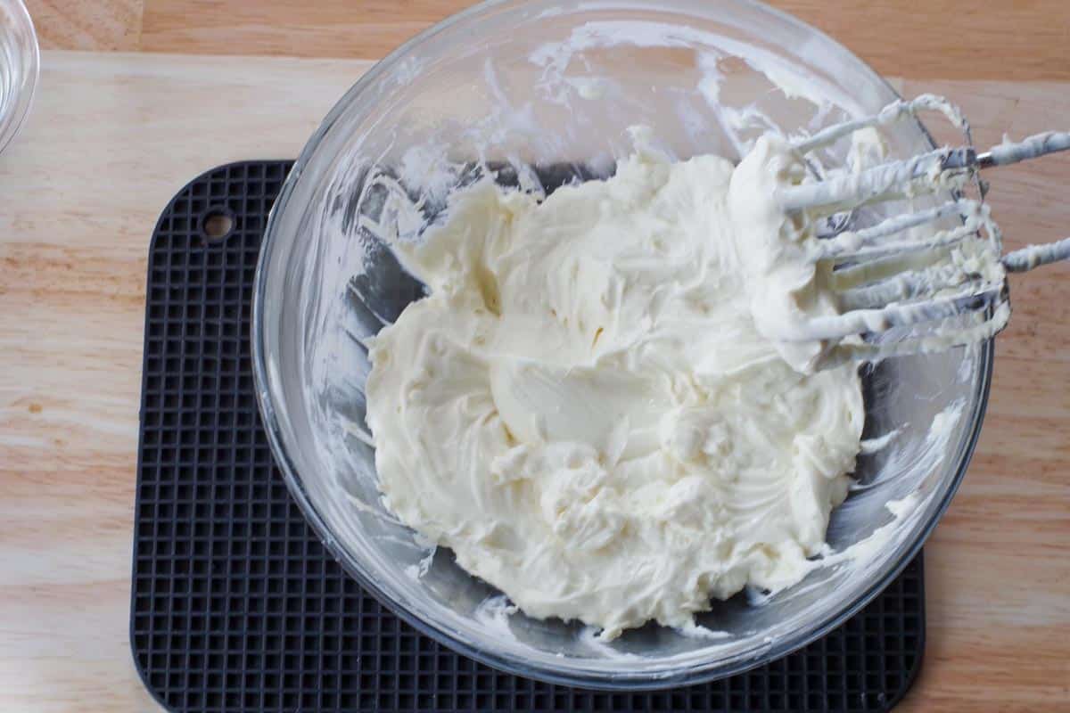 sour cream beaten into cream cheese mixture