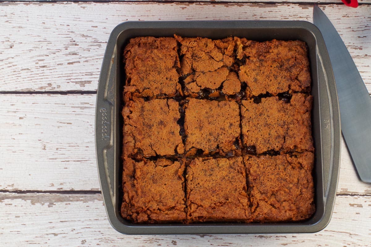 Butter tart squares cut into 9 pieces in pan.