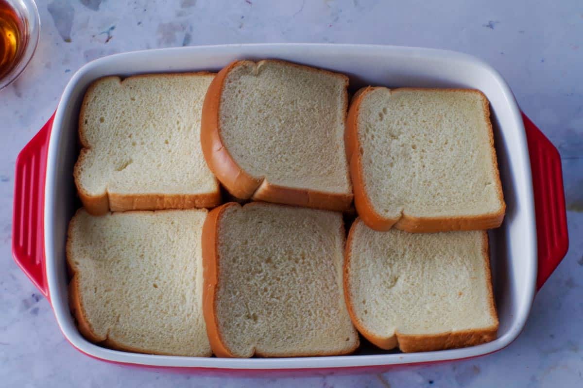 2nd row of bread added to casserole dish.