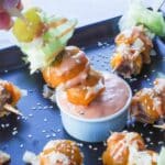 Big Mac Bite being dipped into special sauce