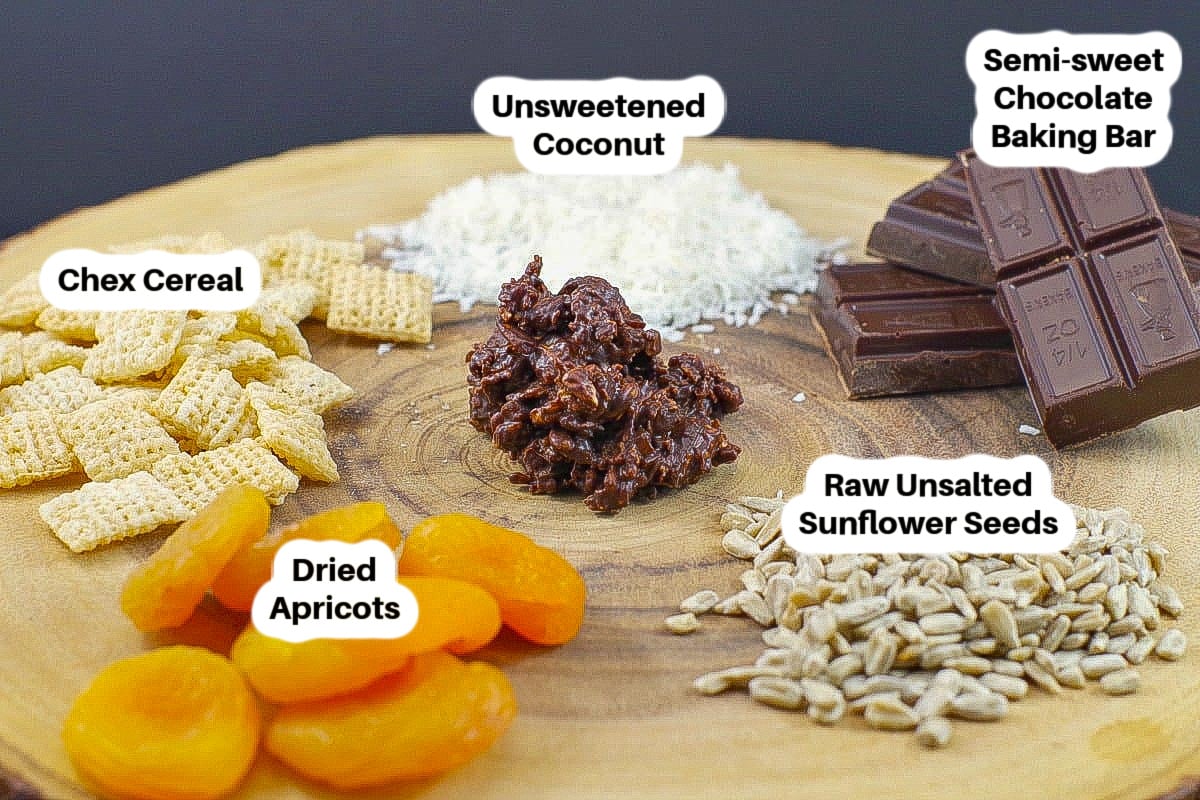 Ingredients in Chocolate Cereal Clusters on a wooden surface, labelled.