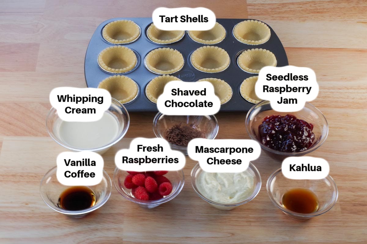 Ingredients in Raspberry Tiramisu Tarts in glass bowls, labelled.