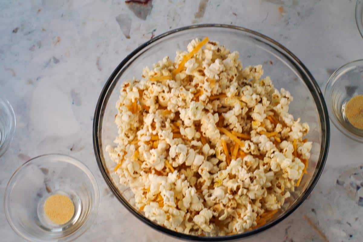 Popcorn mixed with hickory sticks in a large bowl.