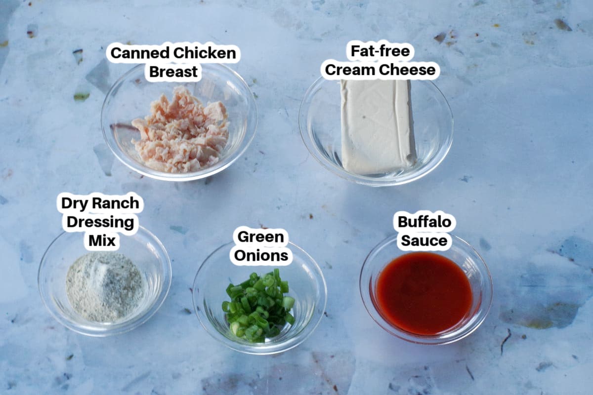 Ingredients in WW Buffalo Chicken Dip in glass bowls, labelled.