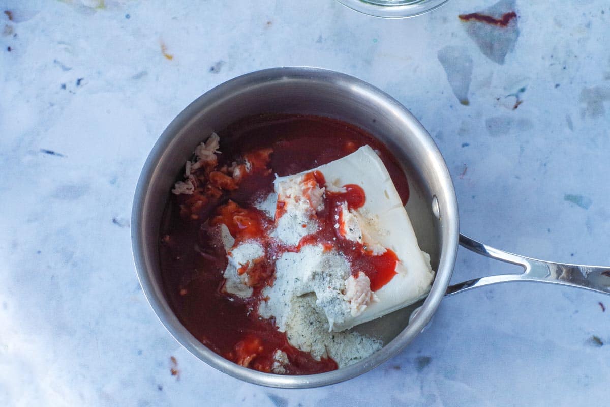 WW Buffalo Chicken Dip ingredients in a small pot.