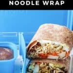 Ramen wrap stacked in a bento lunchbox beside a berry sauce