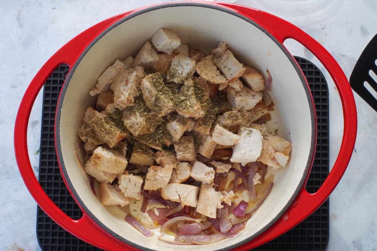 Lemon chicken cut into cubes with Italian seasoning.