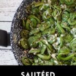Sauteed Fiddleheads in a frying pan.
