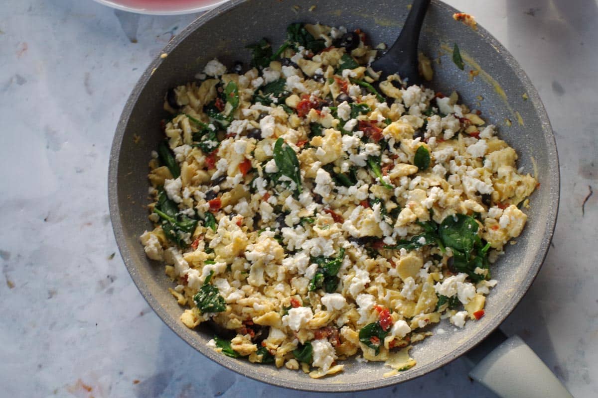 Feta cheese added to egg mixture.