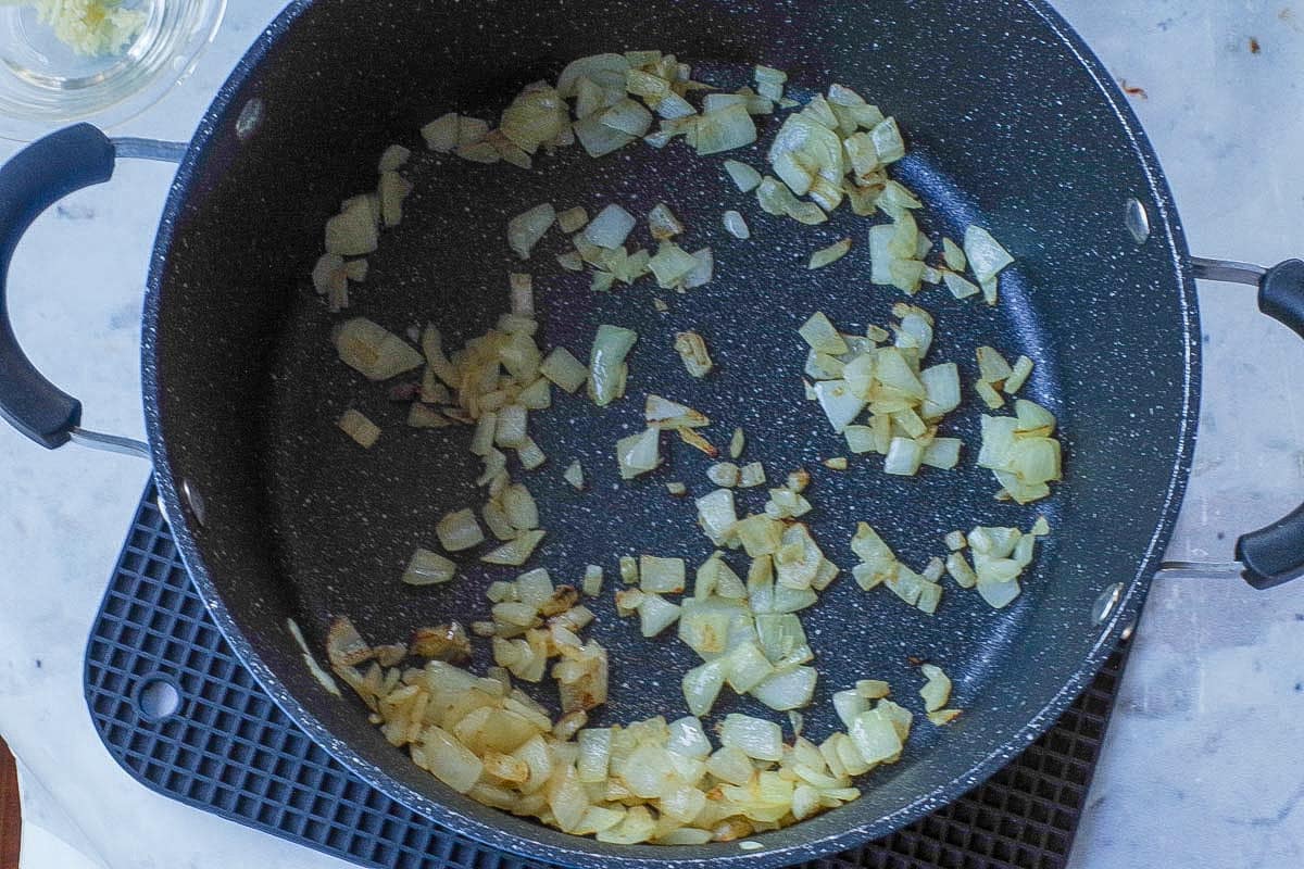 Onions lightly browned in a pot