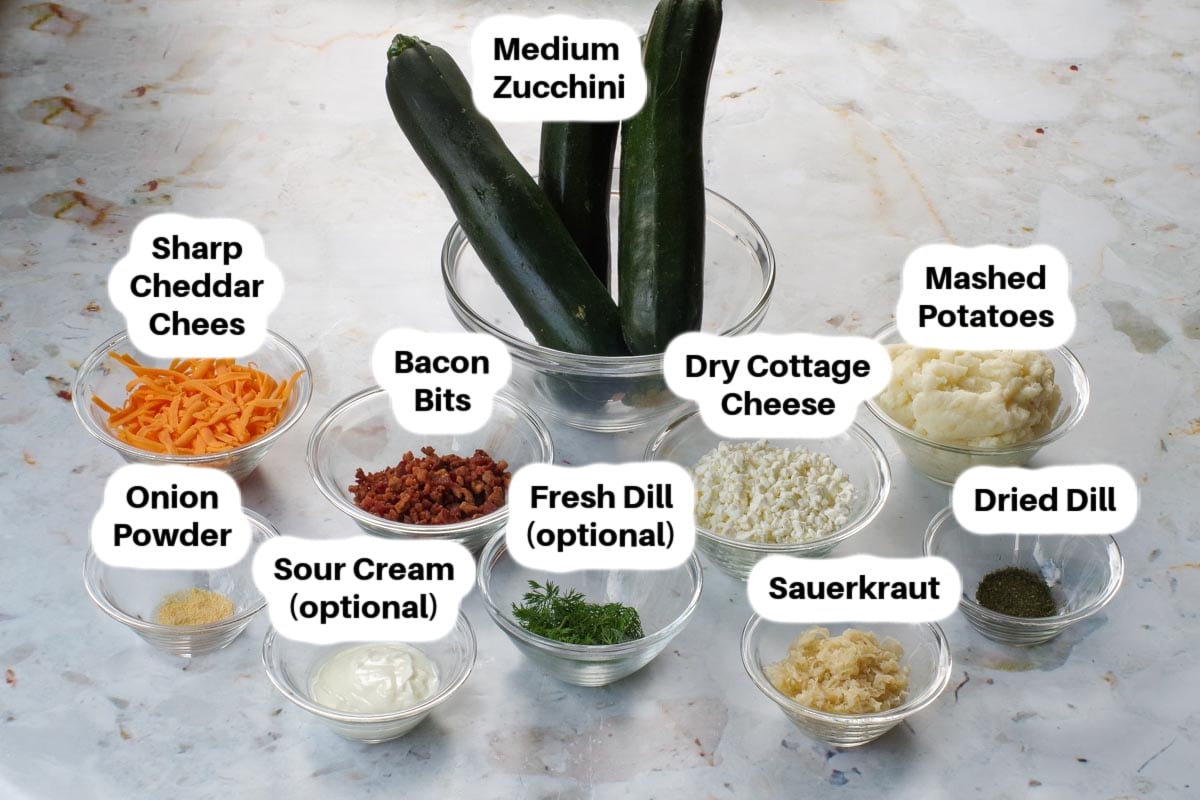 Ingredients in Pierogi Stuffed Zucchini in glass bowls, labelled.