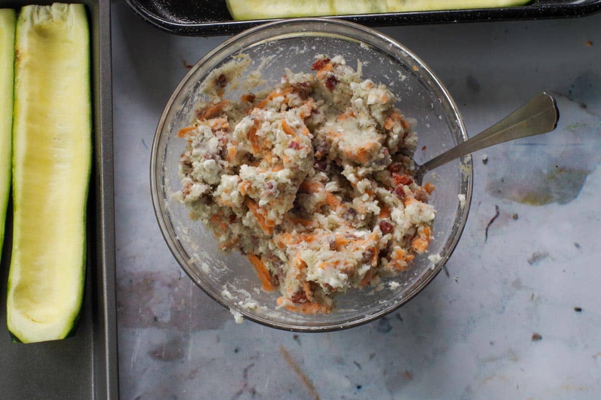 Filling ingredients mixed together in a glass bowl.