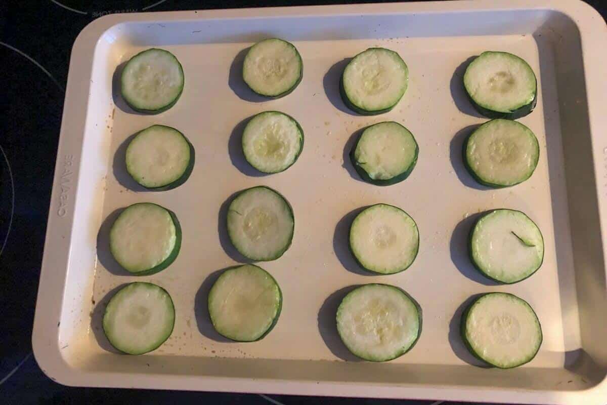 Zucchini bites on a baking sheet.