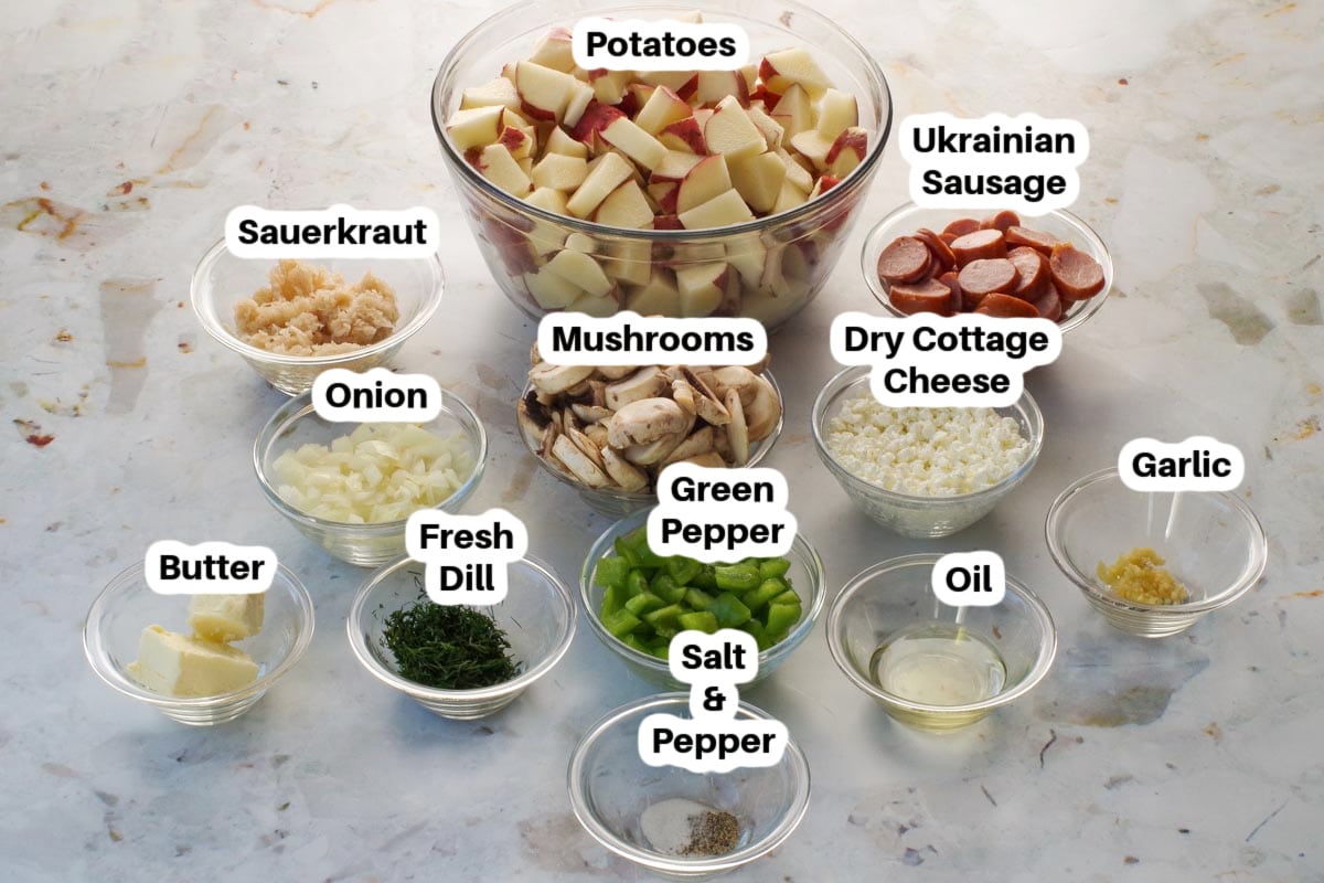 Ingredients in UKrainian breakfast has in glass bowls, labelled.