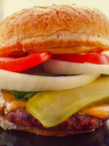 peanut butter burger on a black plate