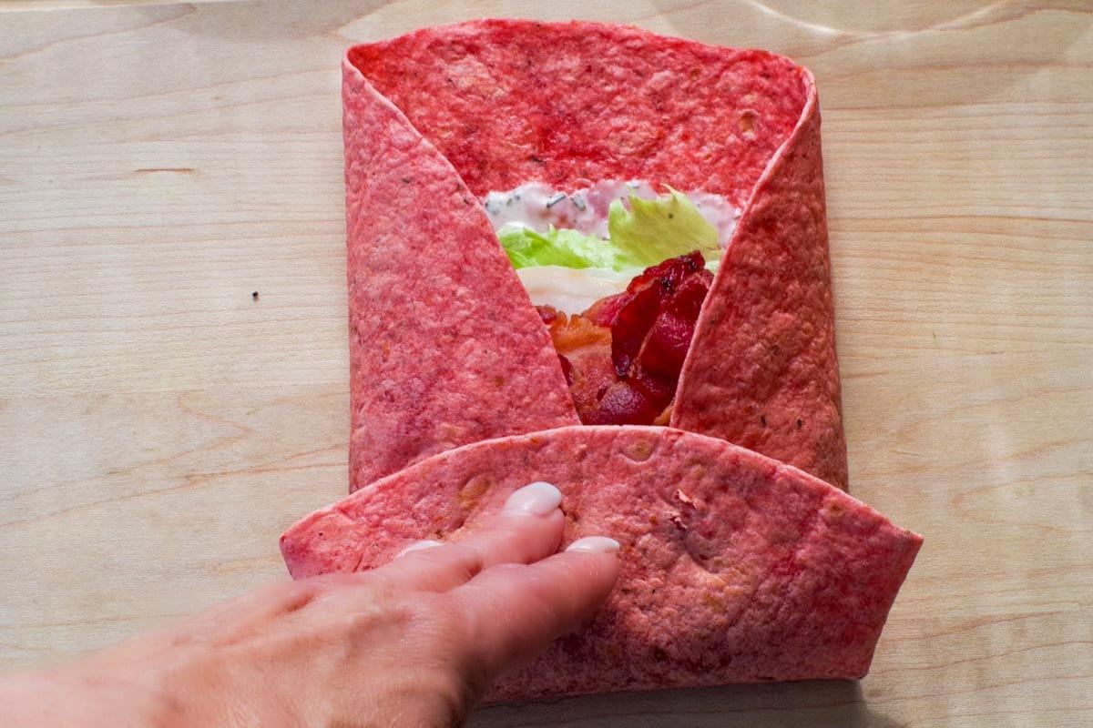 Wrap with the sides folded in and the bottom folded up.