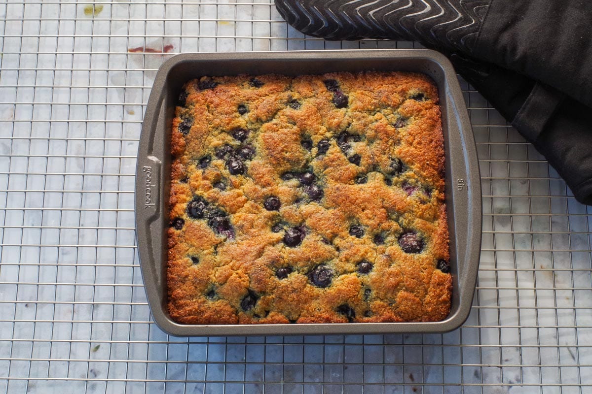 Blueberry Cornbread pan on wire rack.