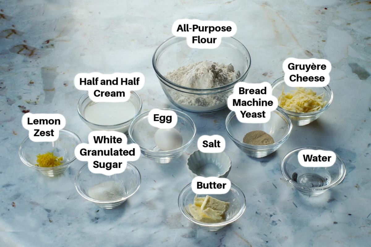 Ingredients in Bread Machine Apple Pie Cinnamon Rolls in glass bowls, labelled.