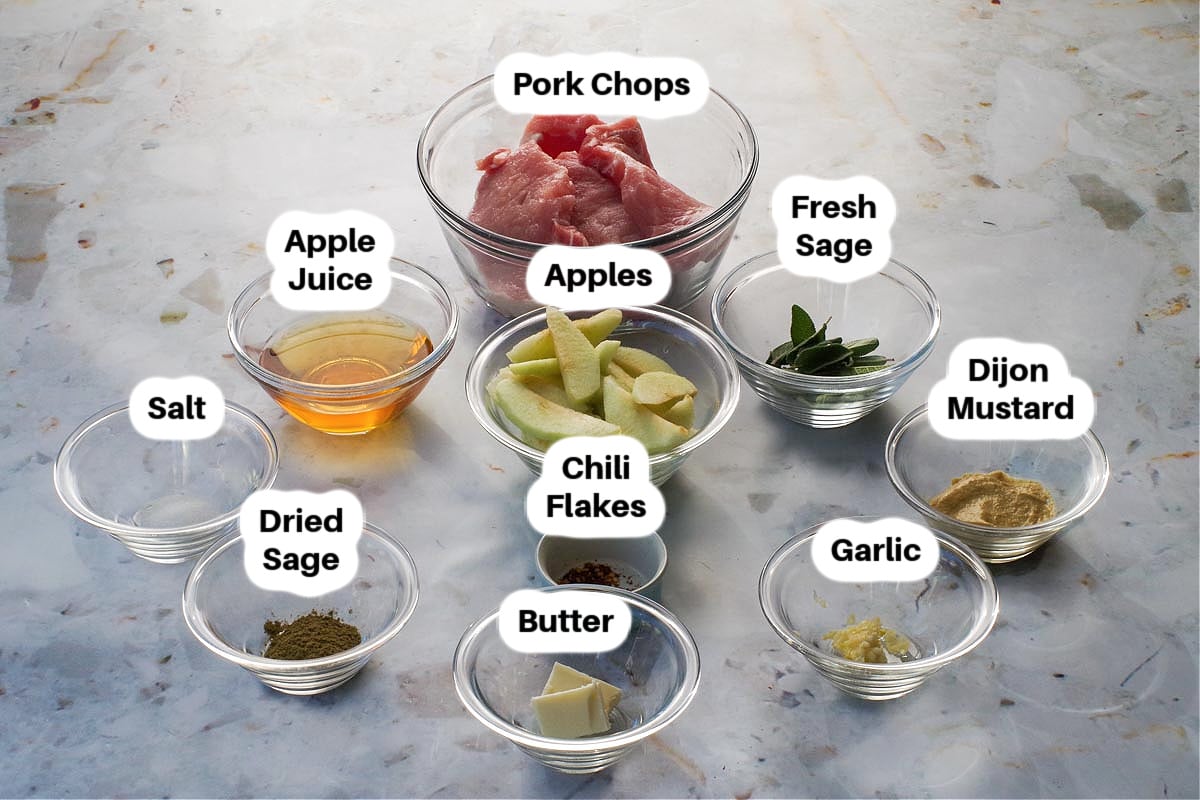 Ingredients in Easy Apple Sage Pork Chops in glass bowls, labelled.