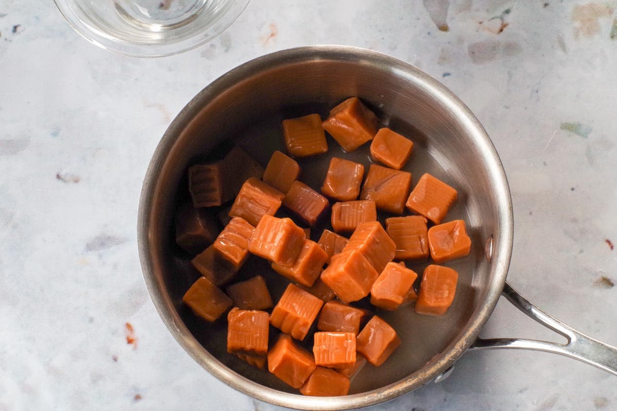 Caramels and water in a medium saucepan.
