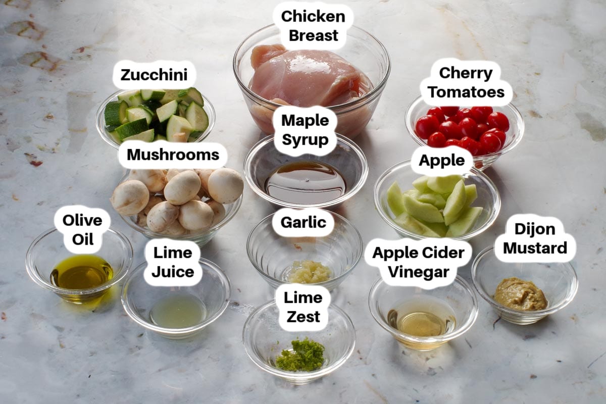 Ingredients in Maple Cider Chicken Kabobs in glass bowls, labelled.