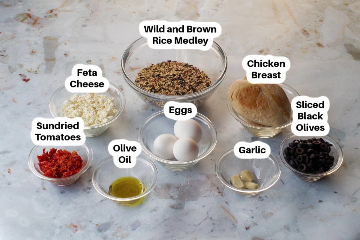 Mediterranean Chicken Rice Cups ingredients in glass bowls, labelled.