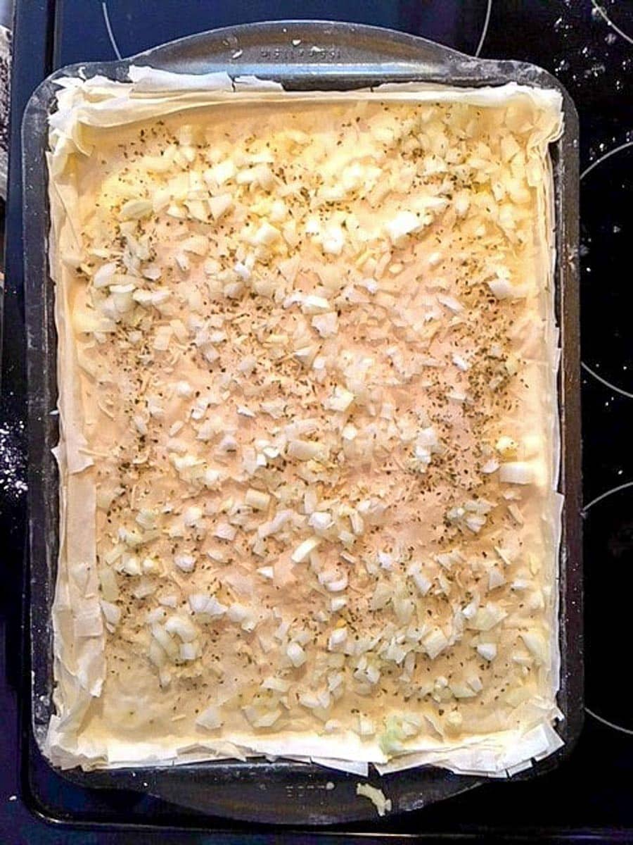 Onion and oregano added to phyllo dough.