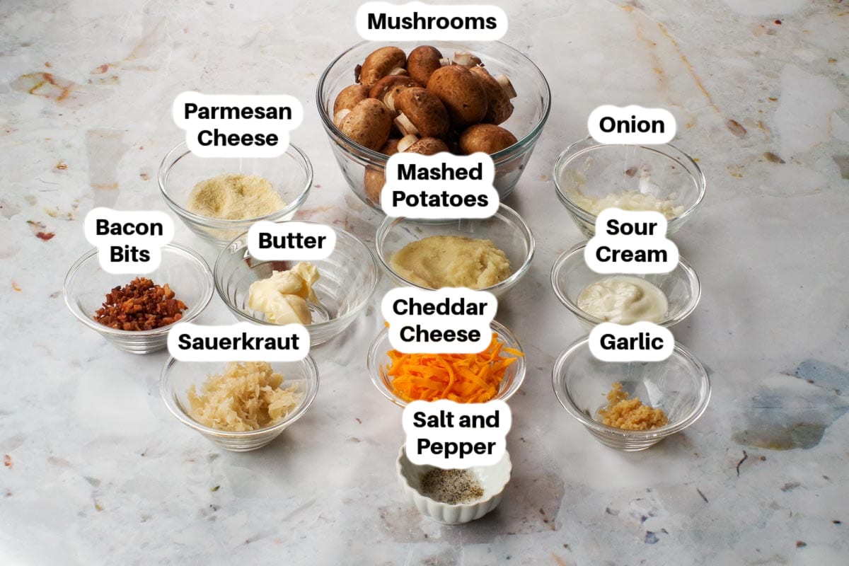Ingredients in Pierogi stuffed mushrooms in glass bowls, labelled.