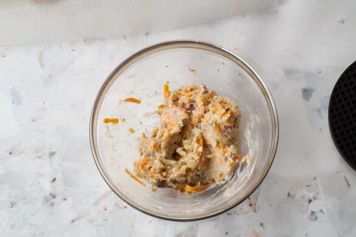 Potatoes, bacon, sauerkruat, cheese and sour cream mixed together.