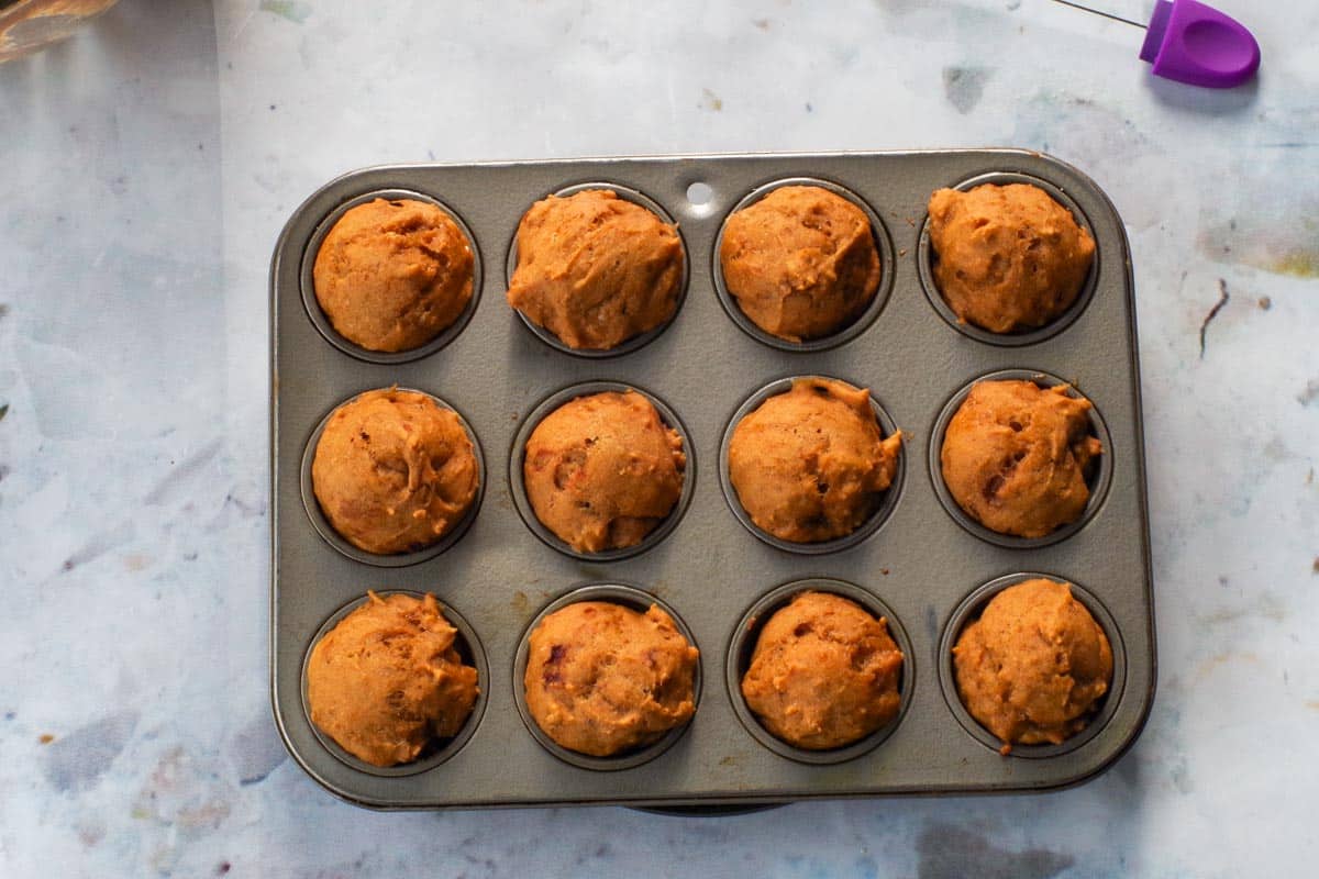 Baked Blondie Bites in a mini muffin tin.