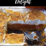 Pumpkin Delight in a glass serving dish with several pieces cut out.