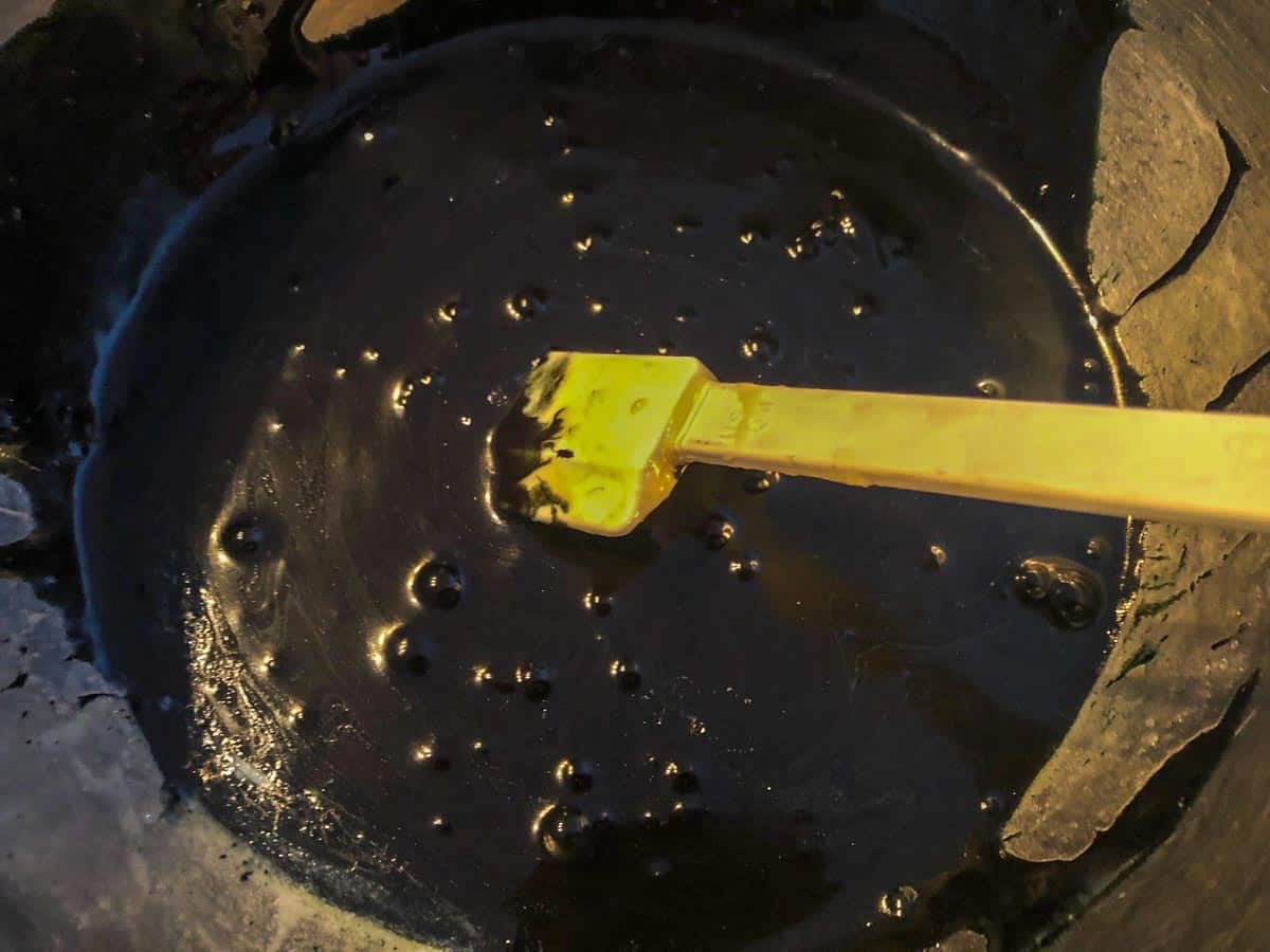 Sweetened condensed milk, melted butter, black food coloring, cake and cookie emulsion or cake batter extract, and salt into a separate large bowl and whisk together.