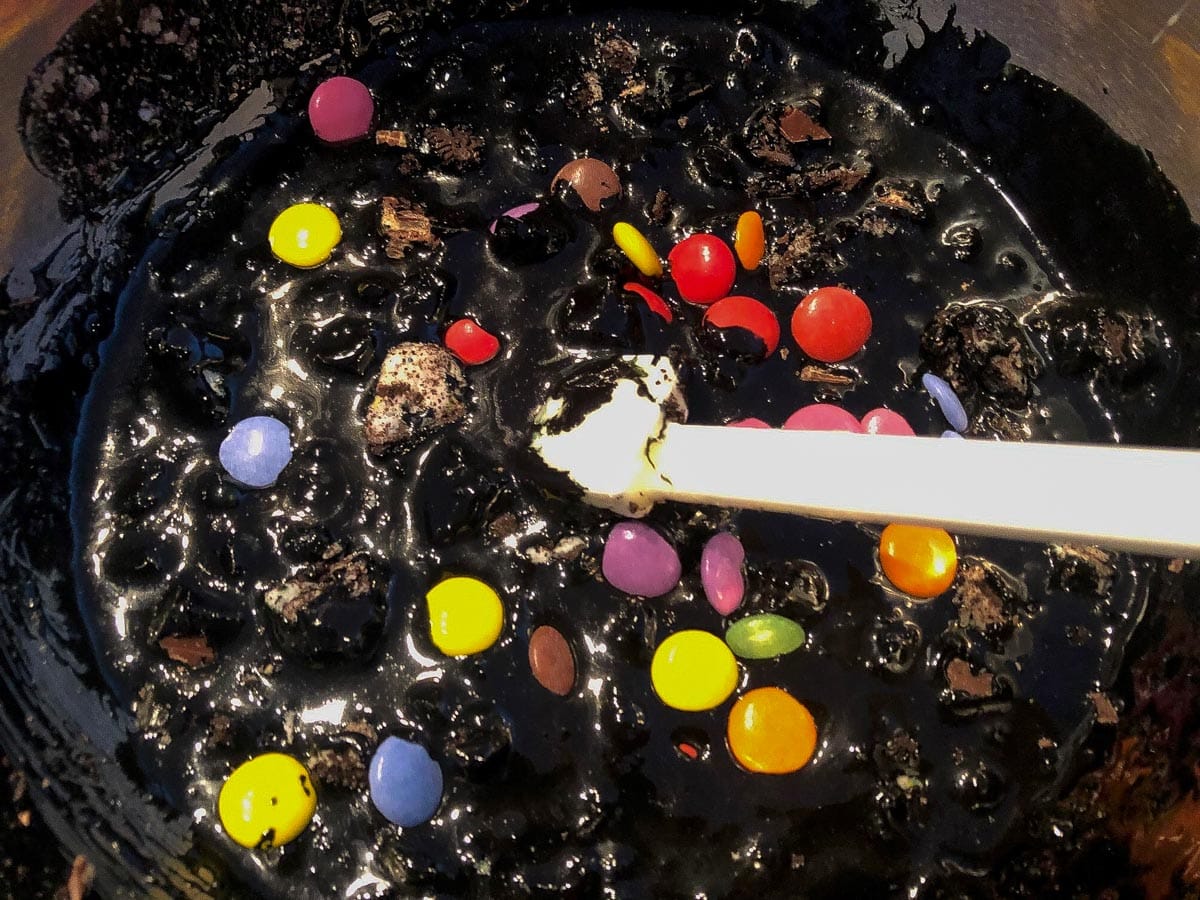 Candy, chocolate and cookies added to the black batter.
