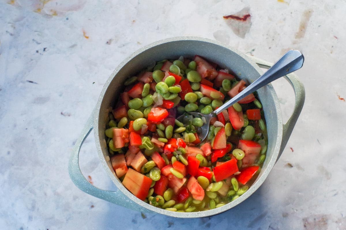Lima beans, tomatoes, herbs and vegetable broth add to succotash.