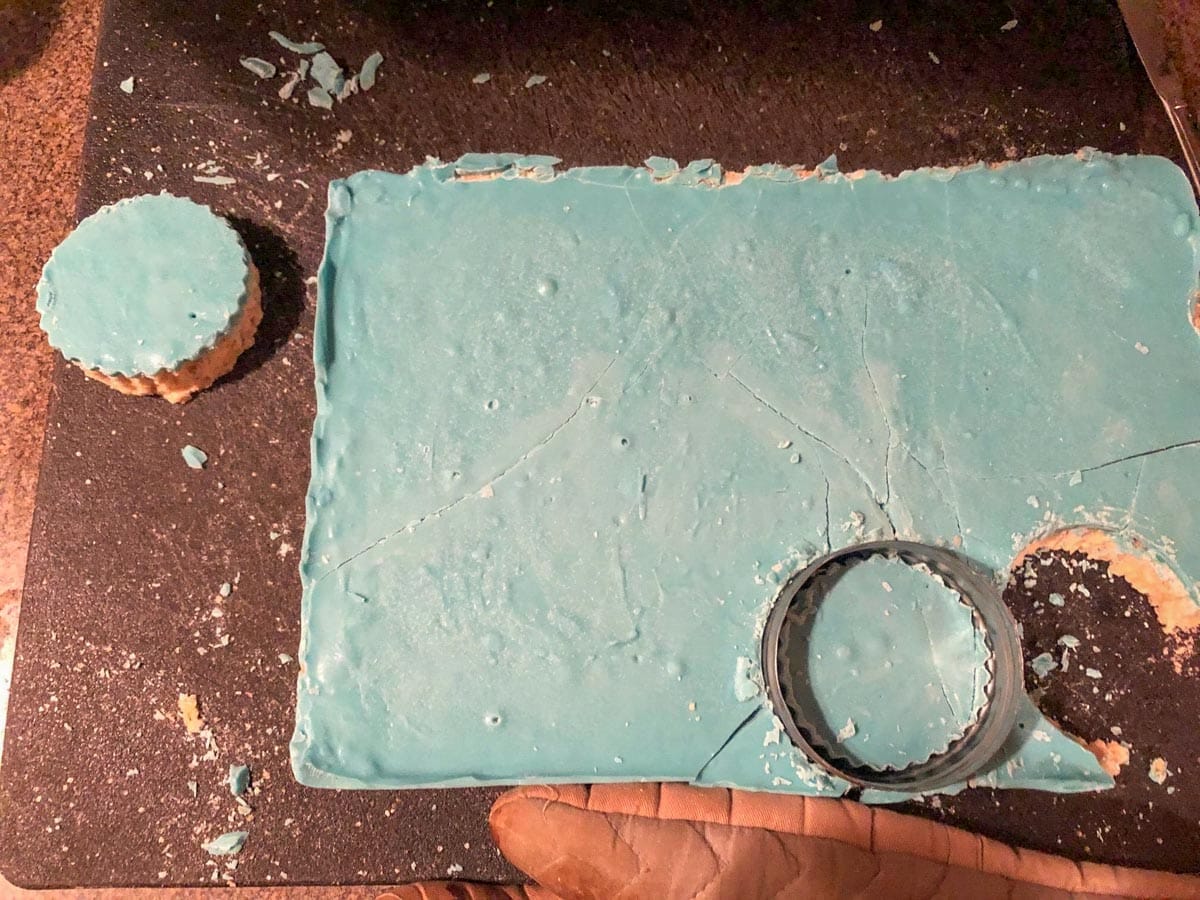 To of snow globe shapes being out of blue rice krispie treats.