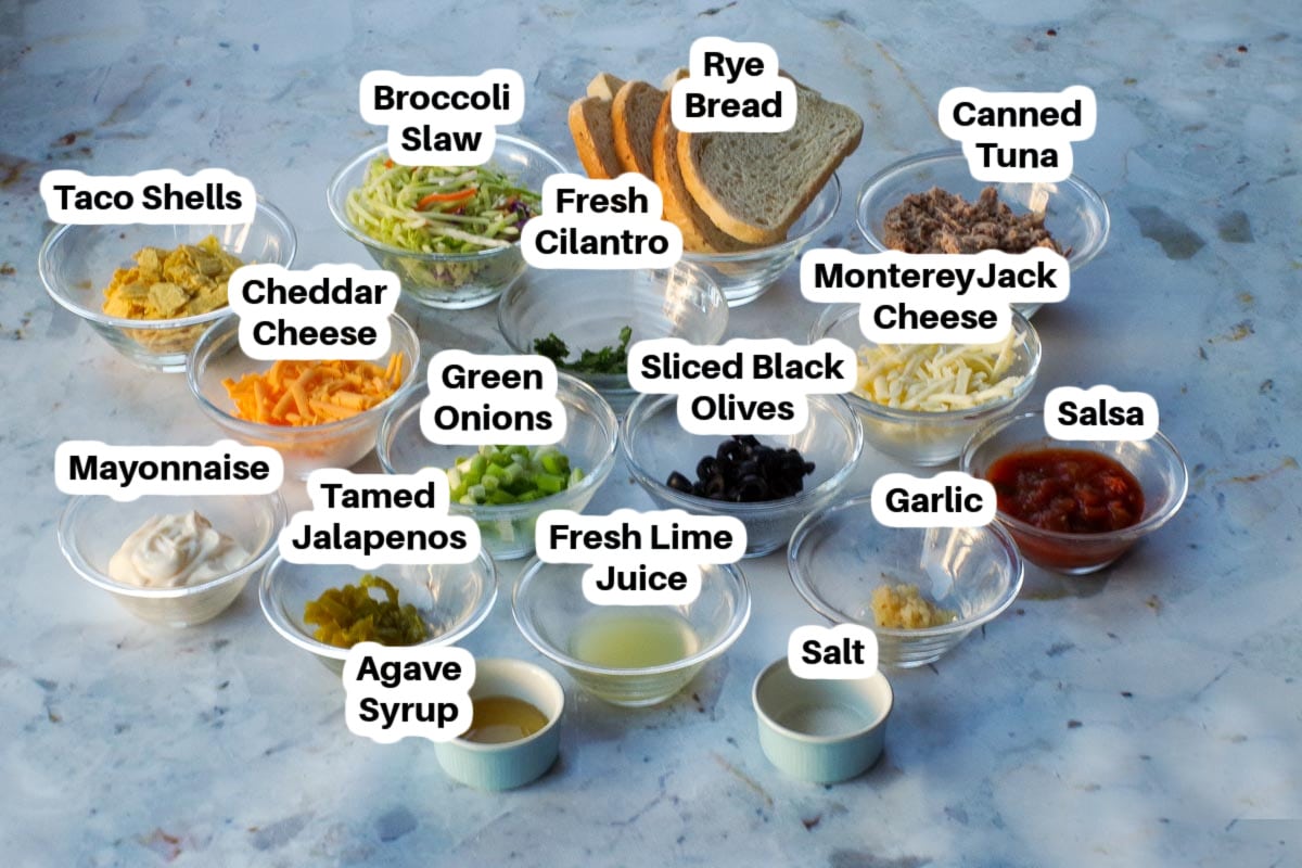 Ingredients in Mexican Tuna melts in glass bowls, labelled.
