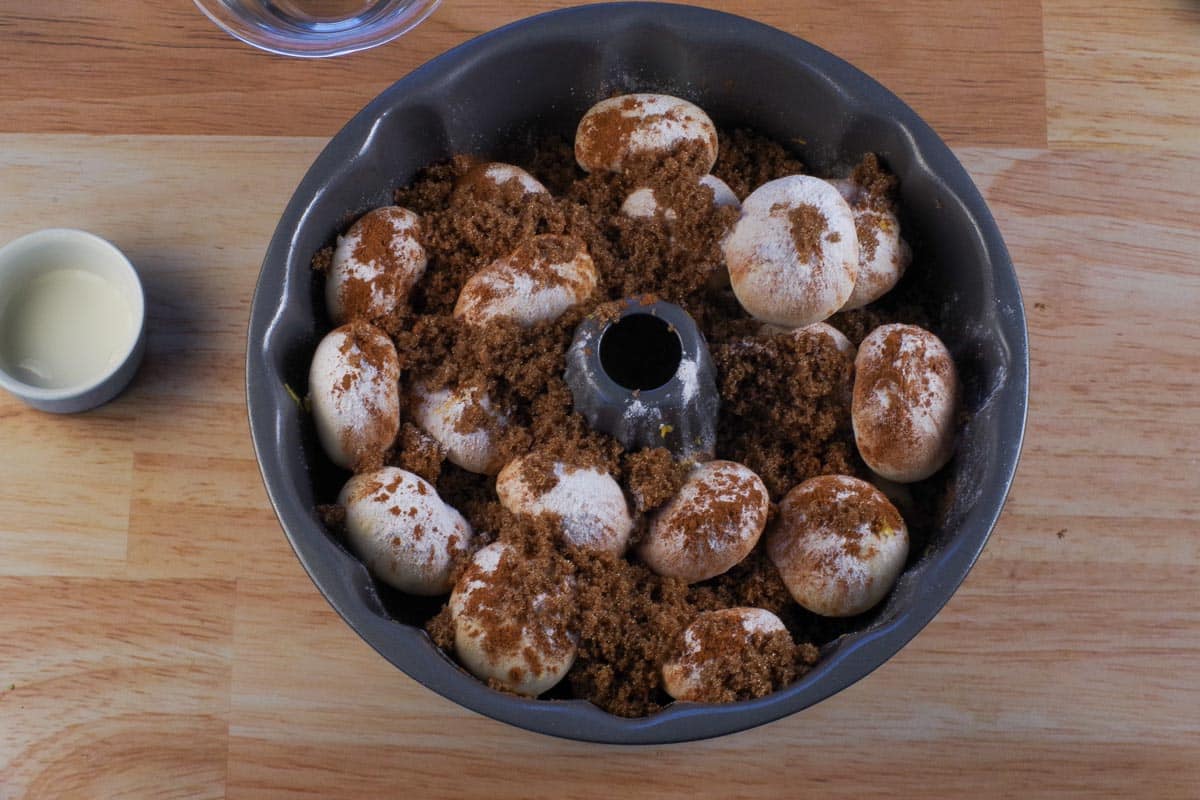 Dry ingredients sprinkled over frozen dinner rolls