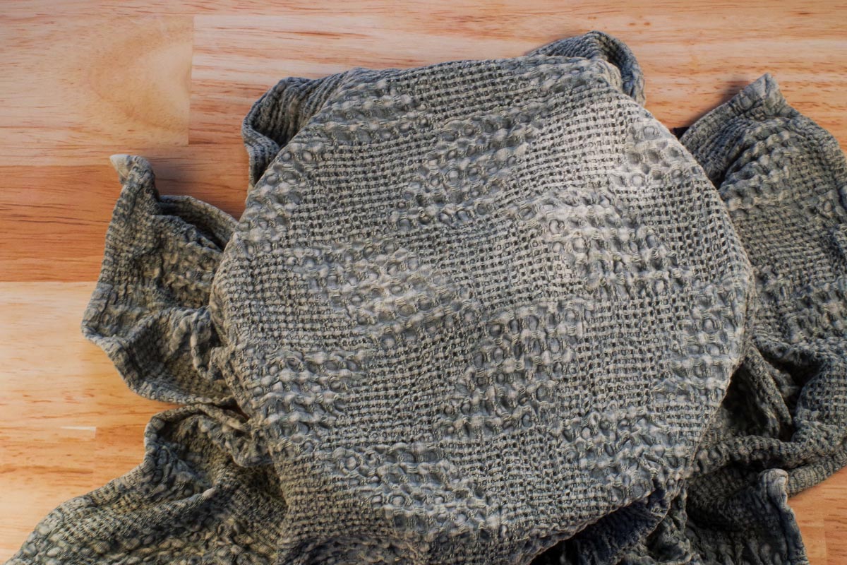 Damp towel covering overnight buns.