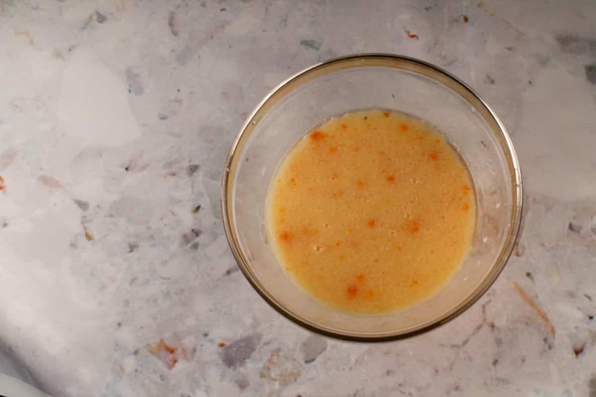 Wet ingredients in small glass bowl.