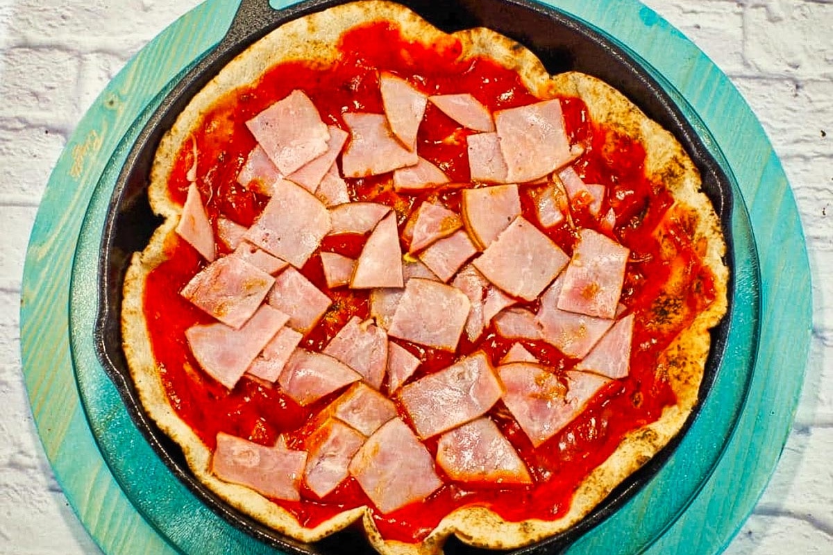 Ham and and pizza sauce on the balady bread.