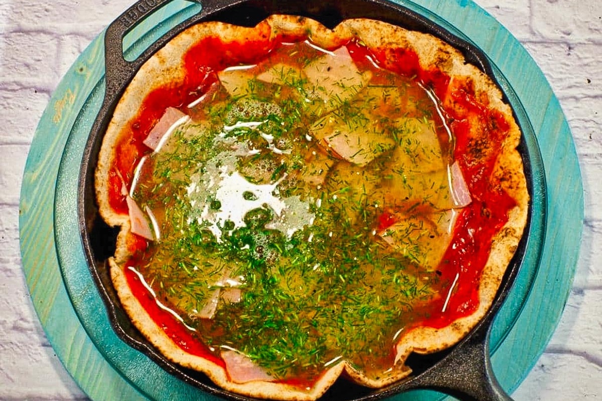 Chives and egg whites added to breakfast pizza.