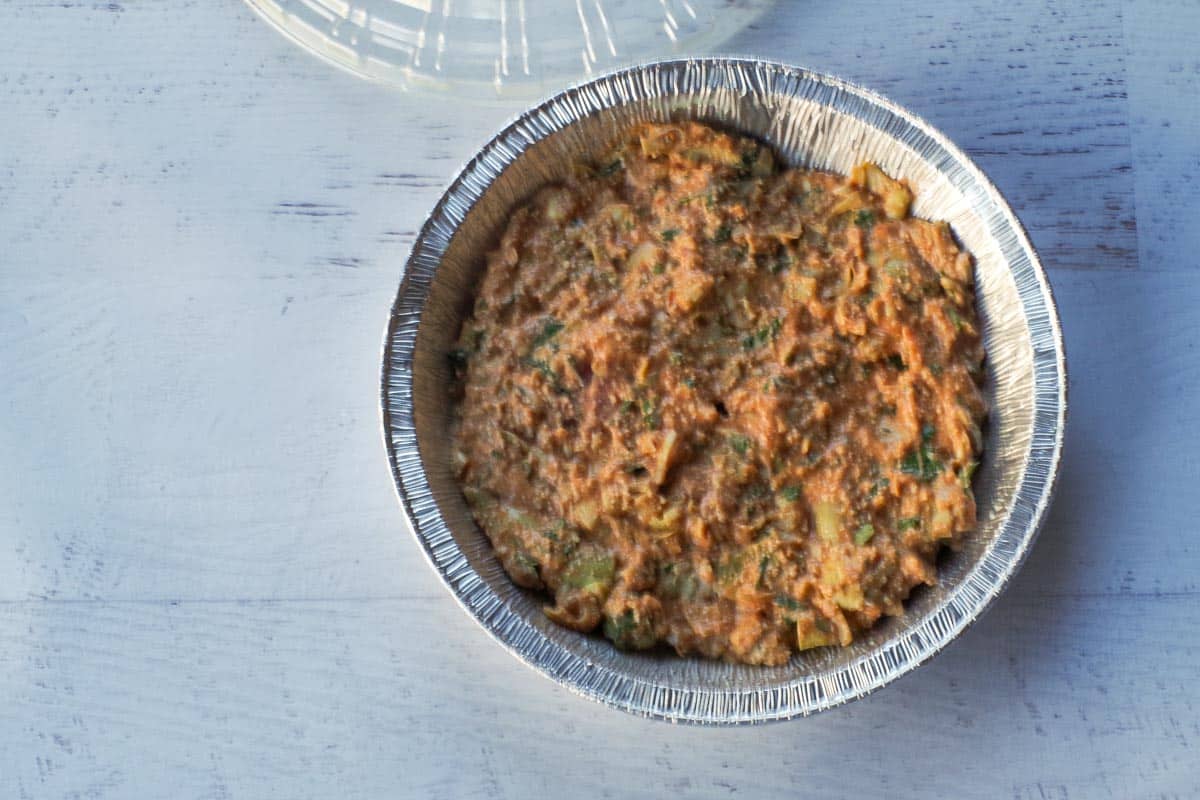 Hot Artichoke Dip in a pie plate.