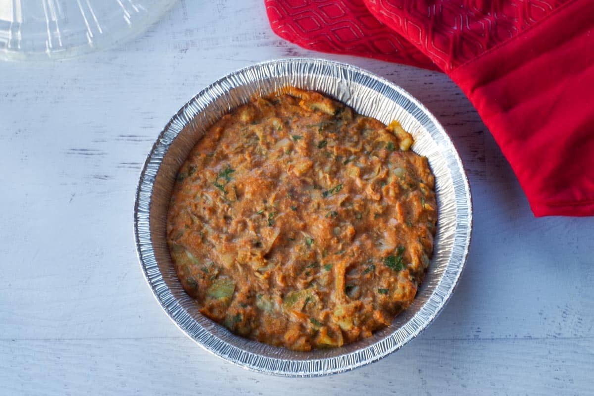 Baked Artichoke Dip in a pie plate, baked.