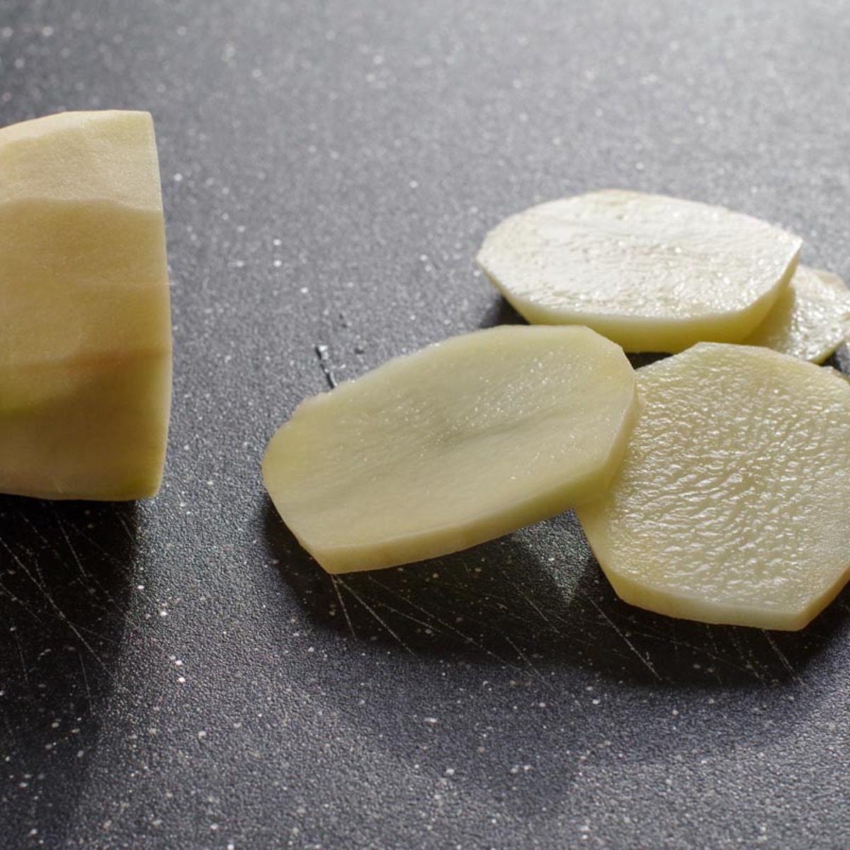 Potatoes cut thin to add to pizza.