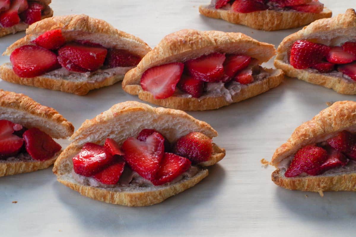 Sliced Strawberries added to croisssants