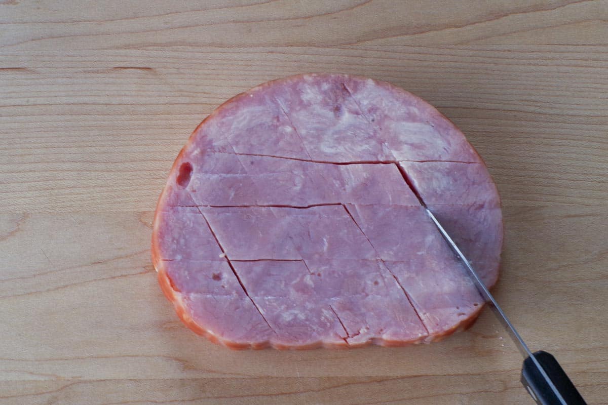 Ham being sliced into.