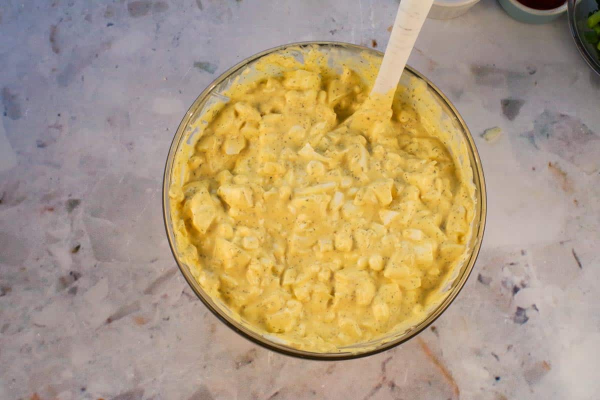 Dip mixture mixed together in glass bowl.